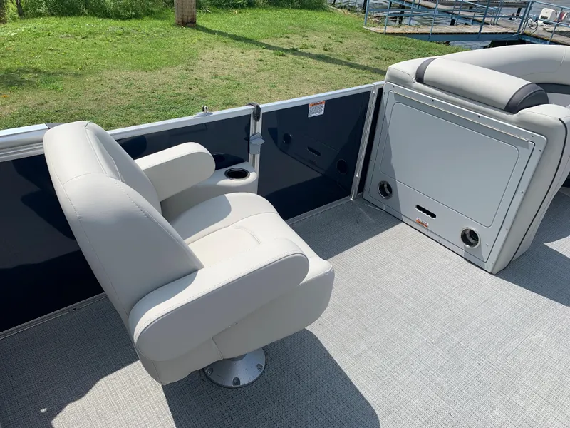Slide: The Image of 2023 Starcraft EX 24 R boat interior with comfortable seating. - 9