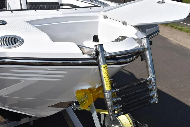 Slide: The Image of 2024 Monterey M6 boat with extended swim platform and ladder. - 13