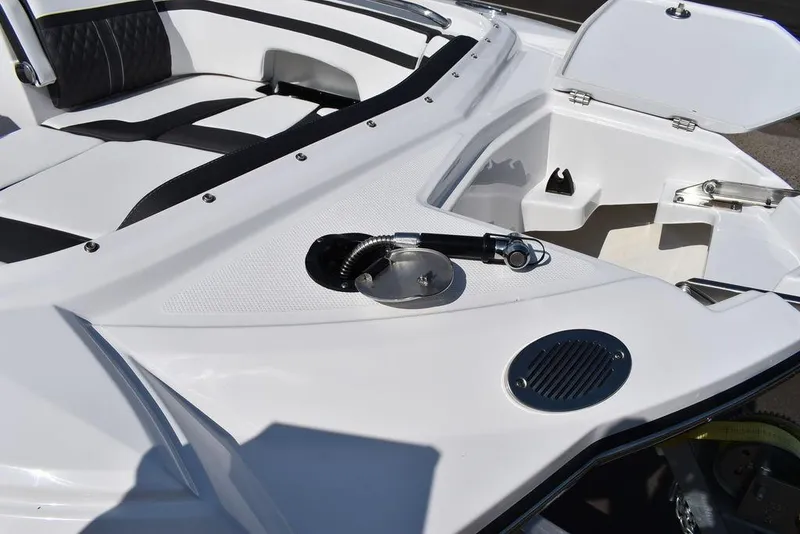 Slide: The Image of 2024 Monterey M6 boat interior with seating and storage compartments. - 14