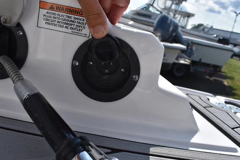 Slide: The Image of Close-up of 2024 Monterey M6 boat's electrical outlet with warning label. - 21