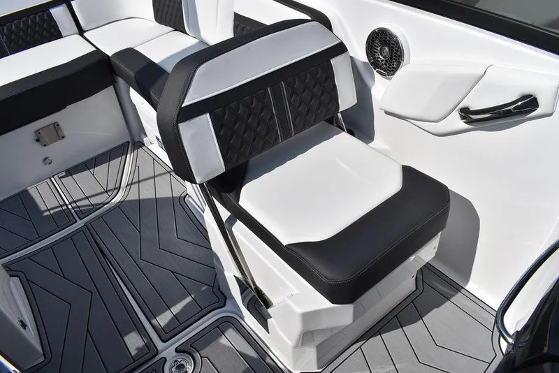 Slide: The Image of 2024 Monterey M6 boat interior with black and white seating and modern design. - 31
