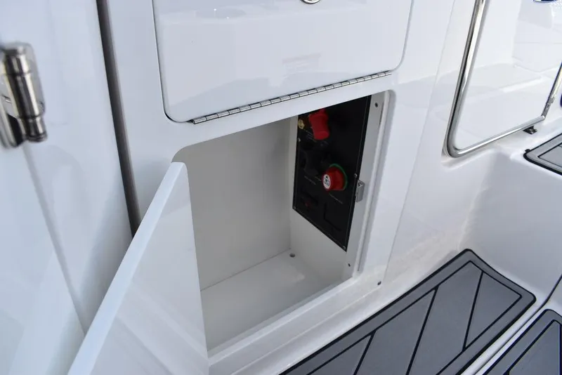 Slide: The Image of 2024 Monterey M6 boat storage compartment with access panel. - 43