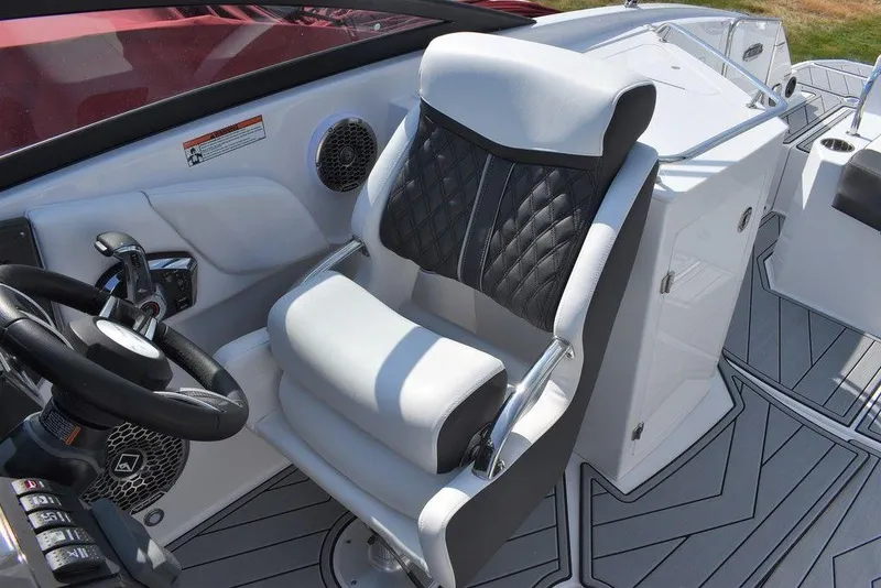 Slide: The Image of 2024 Monterey M6 boat captain's chair and helm station. - 47