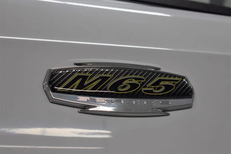 Slide: The Image of 2024 Monterey M-65 Series emblem on white vehicle - 10