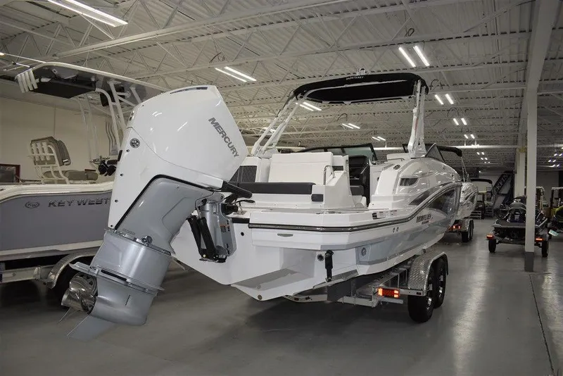 Slide: The Image of 2024 Monterey M-65 boat with Mercury outboard engine in showroom. - 4