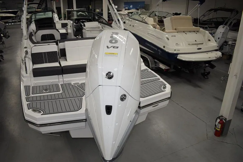 Slide: The Image of 2024 Monterey M-65 boat with V8 engine in showroom. - 7