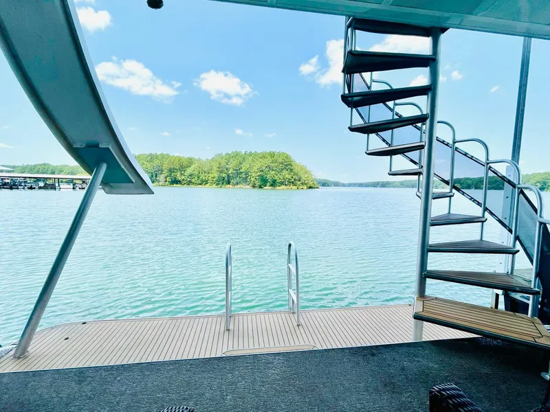 Slide: The Image of View from a 2016 Thoroughbred 67x17 houseboat with spiral staircase and water slide. - 38