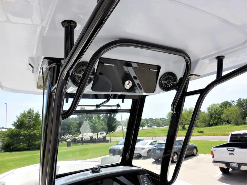 Slide: The Image of 2023 Robalo R250 boat console with black frame and electronics. - 8