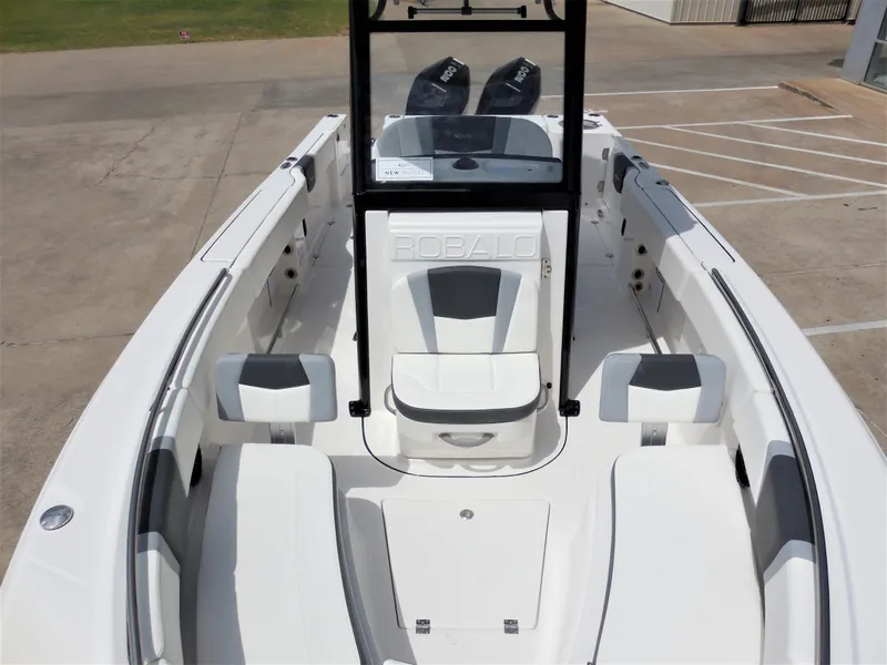 Slide: The Image of 2023 Robalo R250 boat interior with seating and console. - 9