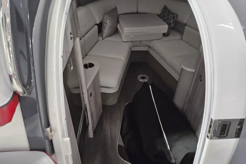 Slide: The Image of Interior of 2023 Formula 310 Sun Sport boat with plush seating and modern design. - 12