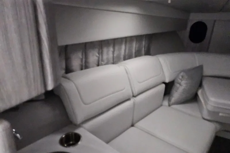 Slide: The Image of Luxurious interior of 2023 Formula 310 Sun Sport boat with plush seating and modern design. - 14