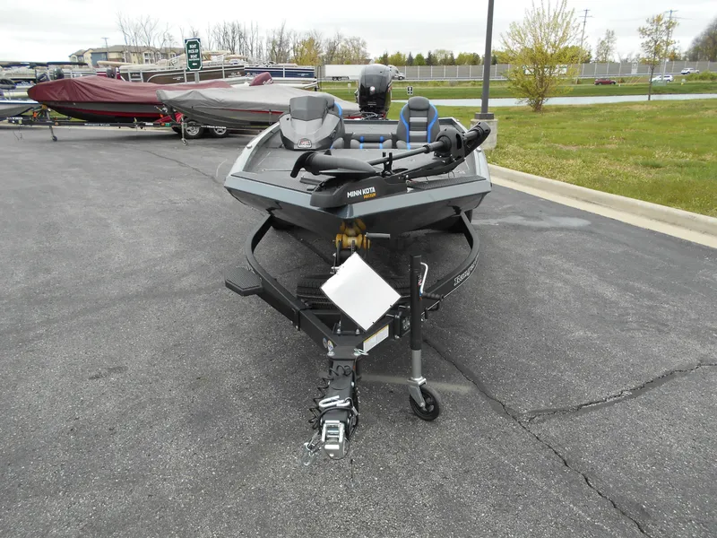 Slide: The Image of 2024 Ranger RT198P fishing boat on trailer in parking lot. - 18