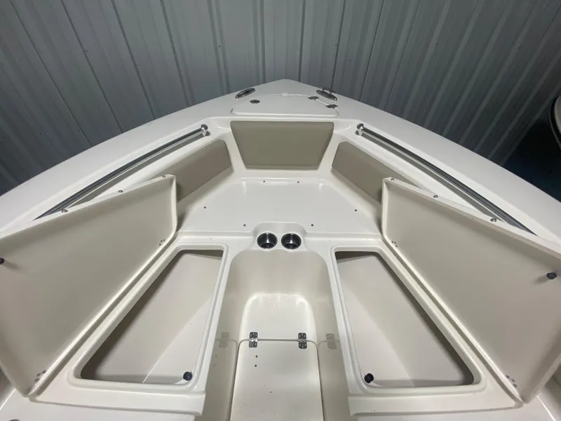Slide: The Image of 2024 Key West 239 FS boat bow storage compartments. - 23