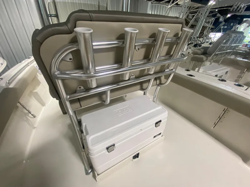Slide: The Image of 2024 Key West 239 FS boat with rod holders and cooler. - 8
