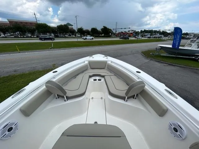 Slide: The Image of 2024 Key West 239 FS boat with spacious seating and modern design. - 12