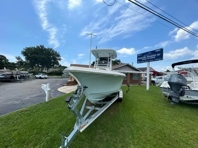 Slide: The Image of 2024 Key West 239 FS boat on trailer at Angler's Marine NC dealership. - 2