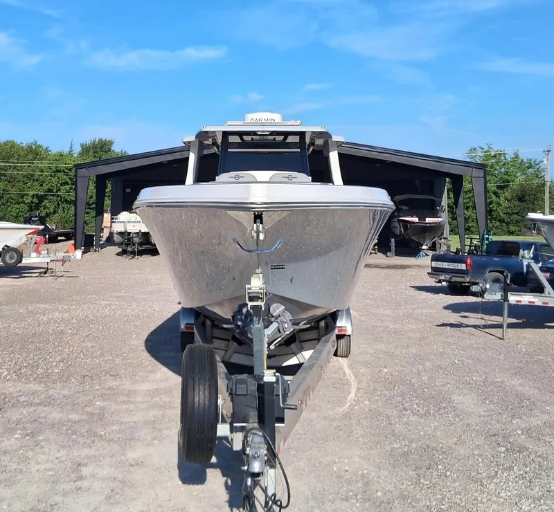 Slide: The Image of 2023 Fountain 38 SCX boat on trailer in outdoor storage area. - 40