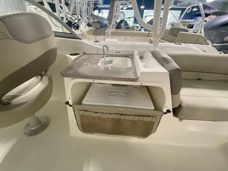Slide: The Image of 2024 Key West 239 DFS boat interior with sink and seating. - 10