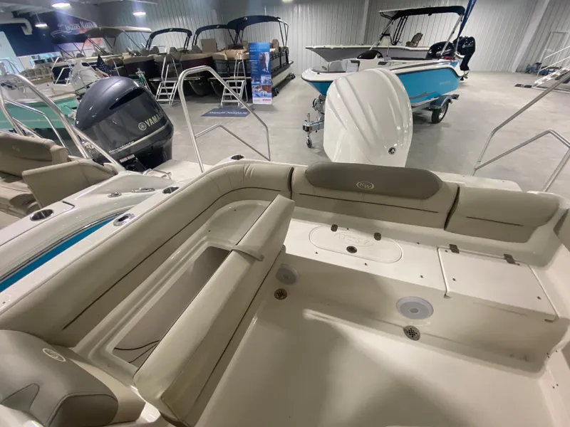 Slide: The Image of 2024 Key West 239 DFS boat interior with seating and storage compartments. - 5