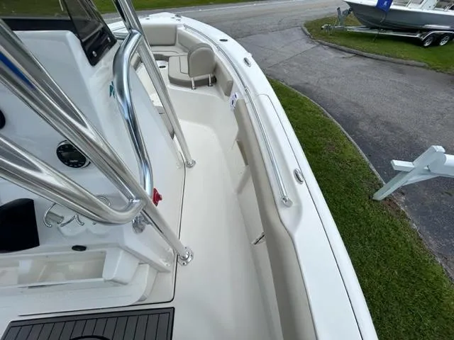 Slide: The Image of 2024 Key West 239 FS boat deck with stainless steel railings and seating. - 11