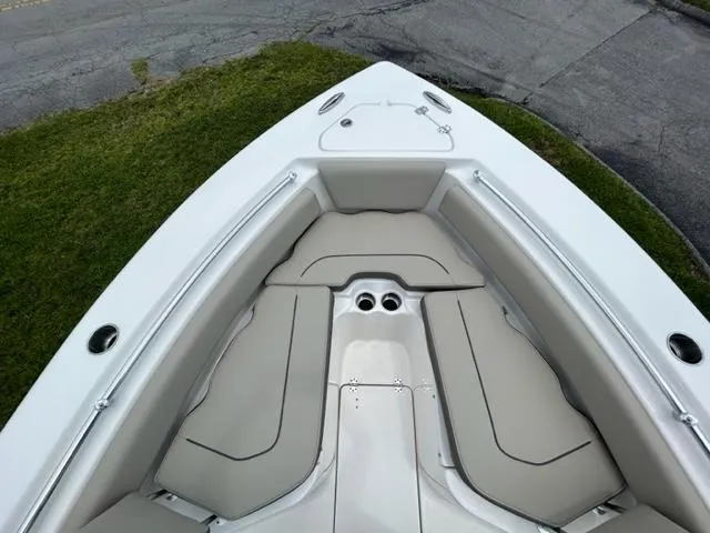 Slide: The Image of 2024 Key West 239 FS boat bow seating area with cushioned seats. - 13