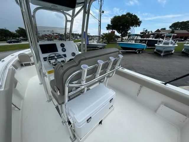 Slide: The Image of 2024 Key West 239 FS boat interior with console and seating. - 16