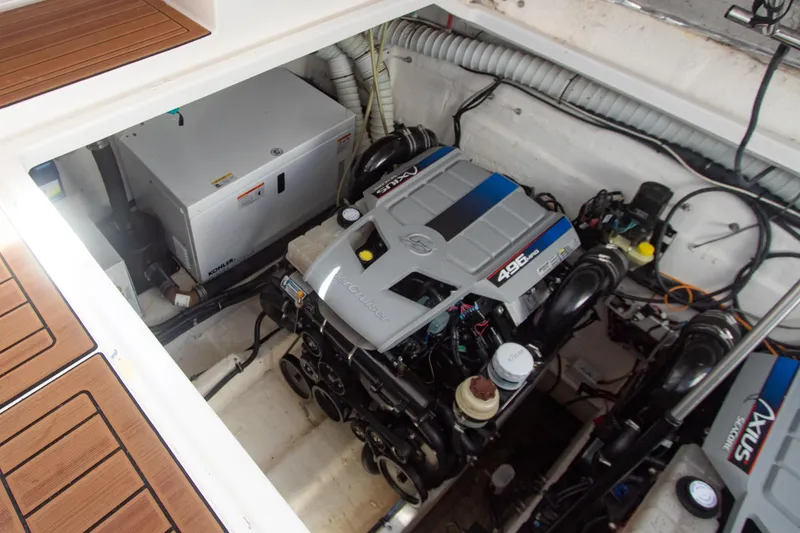 Slide: The Image of Engine compartment of a 2008 Rinker 400 Express Cruiser with MerCruiser 496 MAG engines. - 18