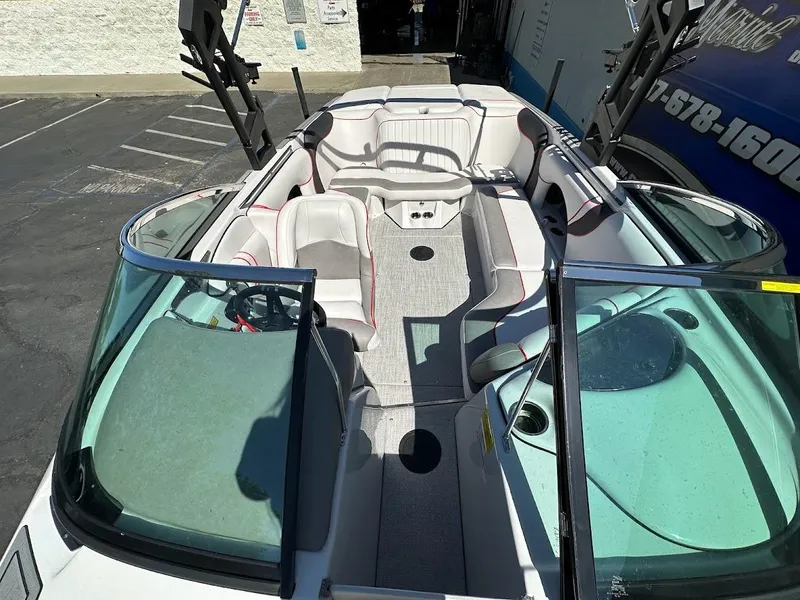 Slide: The Image of 2024 Sanger V237 S boat interior with seating and open bow design. - 15