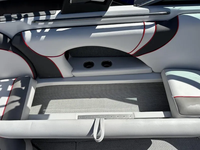 Slide: The Image of Interior seating of 2024 Sanger V237 S boat with modern design and cup holders. - 25