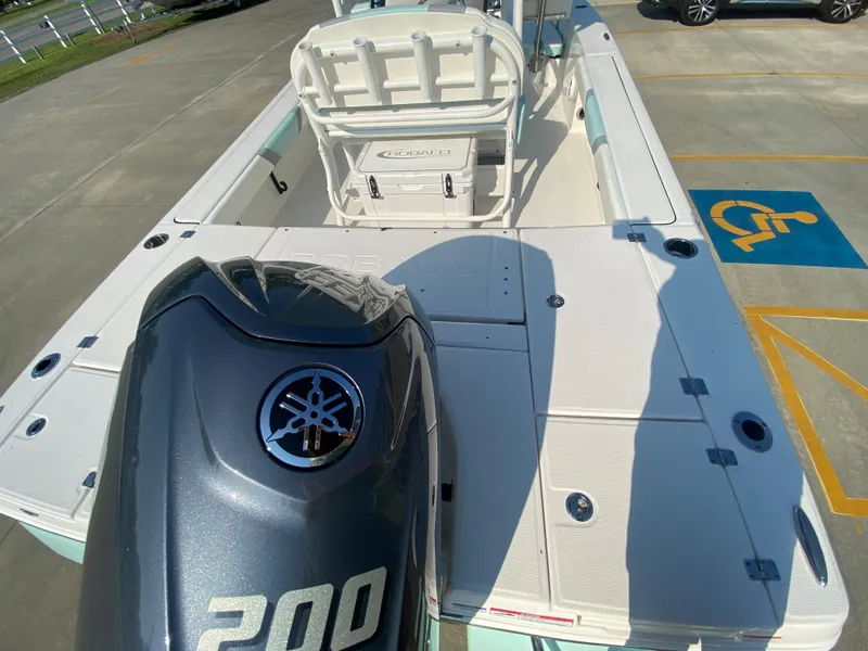Slide: The Image of 2024 Robalo 226 Cayman boat with Yamaha 200 engine, rear deck view. - 7