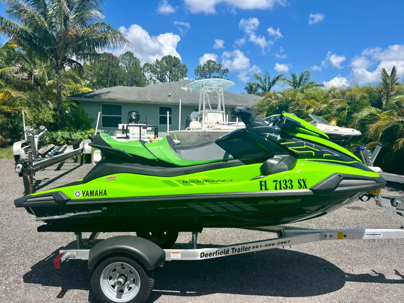 Slide: The Image of 2021 Yamaha WaveRunner VX Cruiser in green on a trailer. - 4