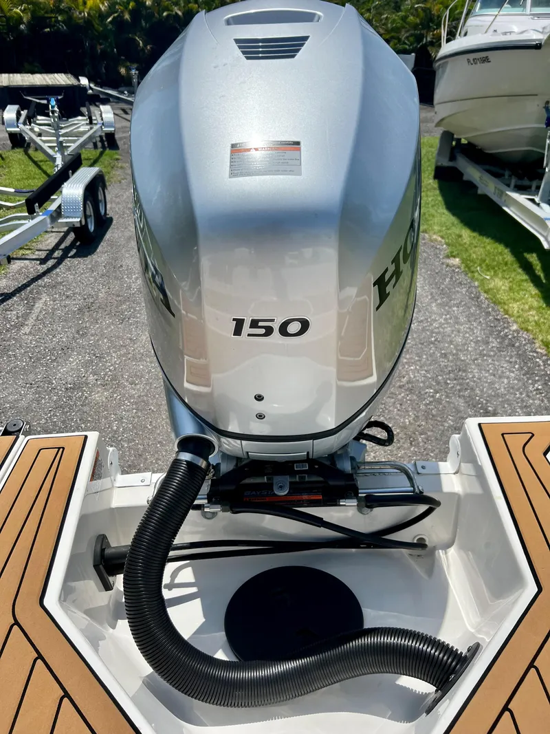 Slide: The Image of 2021 Starcraft 211 SVX boat with Honda 150 outboard motor. - 16