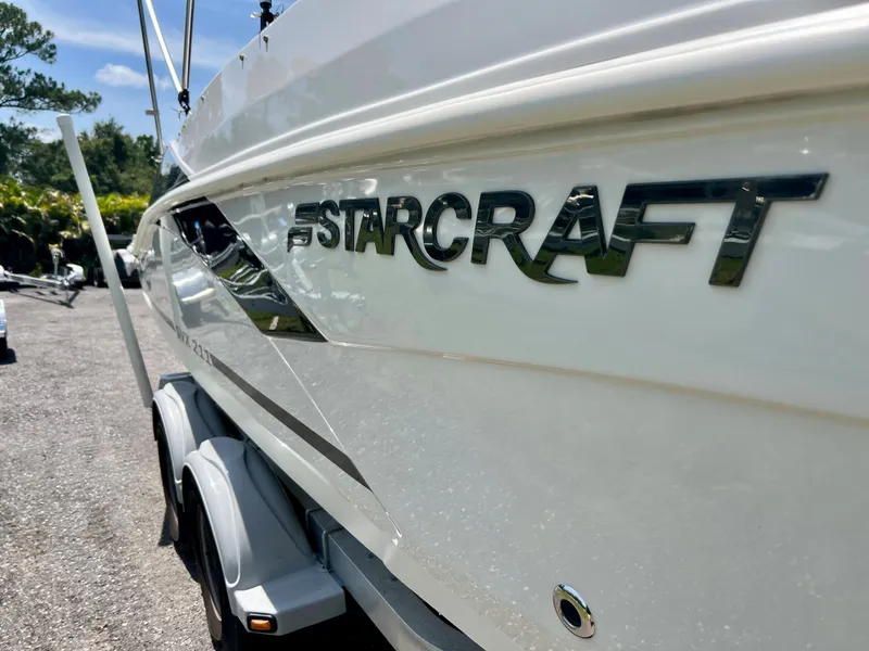 Slide: The Image of 2021 Starcraft 211 SVX boat on trailer, side view. - 6