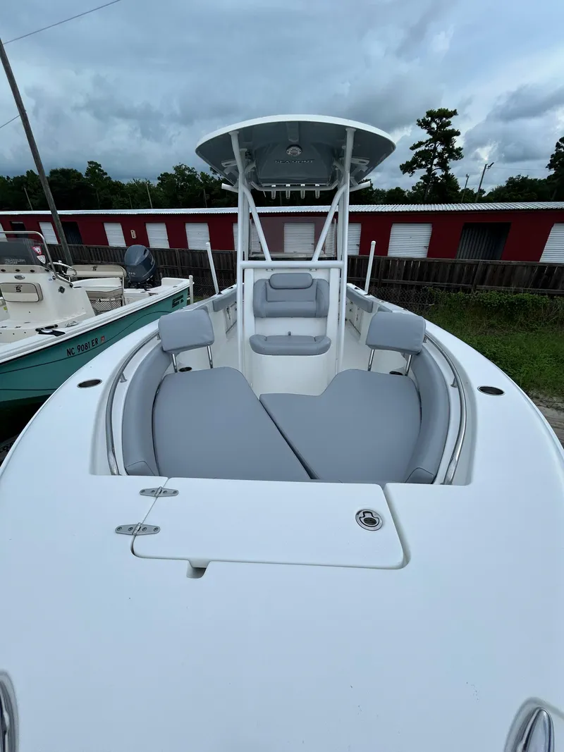 Slide: The Image of 2019 Sea Hunt 225 Ultra boat with spacious seating and sleek design. - 27