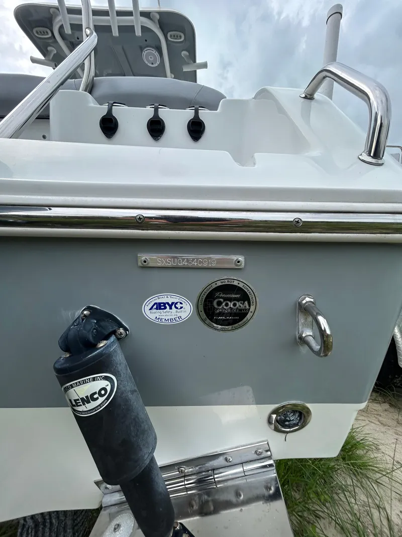 Slide: The Image of 2019 Sea Hunt 225 Ultra boat stern with ABYC and Coosa labels. - 6