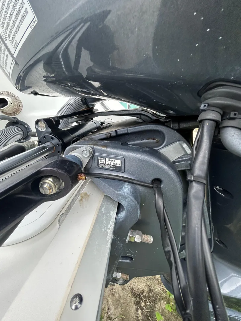 Slide: The Image of Close-up of 2019 Sea Hunt 225 Ultra boat engine components and wiring. - 7