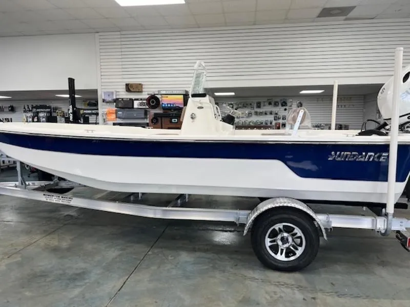 The Image of 2024 Sundance B20CCR boat on trailer in showroom. - 0