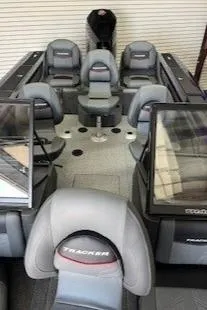 Slide: The Image of Close-up of 2024 Tracker Targa V-19 Combo boat's PowerDrive motor. - 14