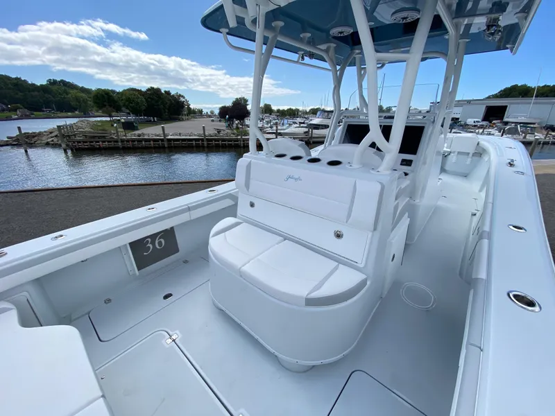 Slide: The Image of 2024 Yellowfin 36 Center Console boat docked at a marina. - 10