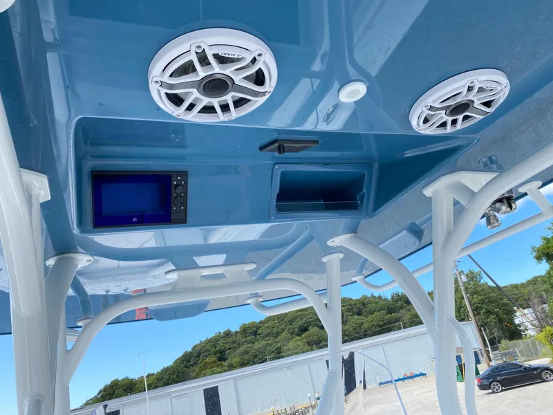 Slide: The Image of 2024 Yellowfin 36 Center Console boat with overhead speakers and electronics. - 14