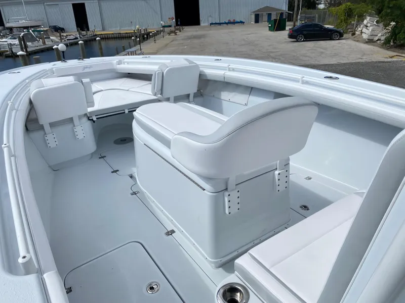 Slide: The Image of 2024 Yellowfin 36 Center Console boat with white seating and spacious deck. - 18