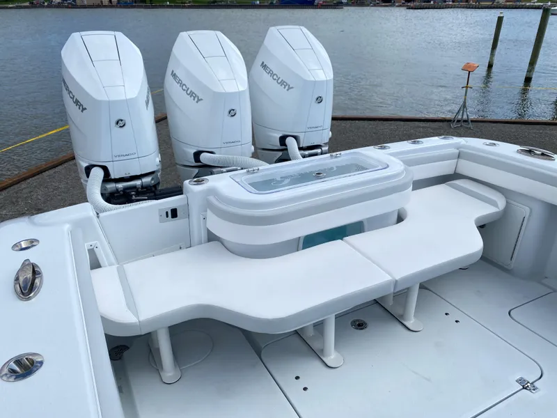 Slide: The Image of 2024 Yellowfin 36 Center Console with triple Mercury outboard engines. - 5