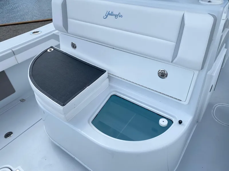 Slide: The Image of 2024 Yellowfin 36 Center Console boat interior with seating and storage compartments. - 9
