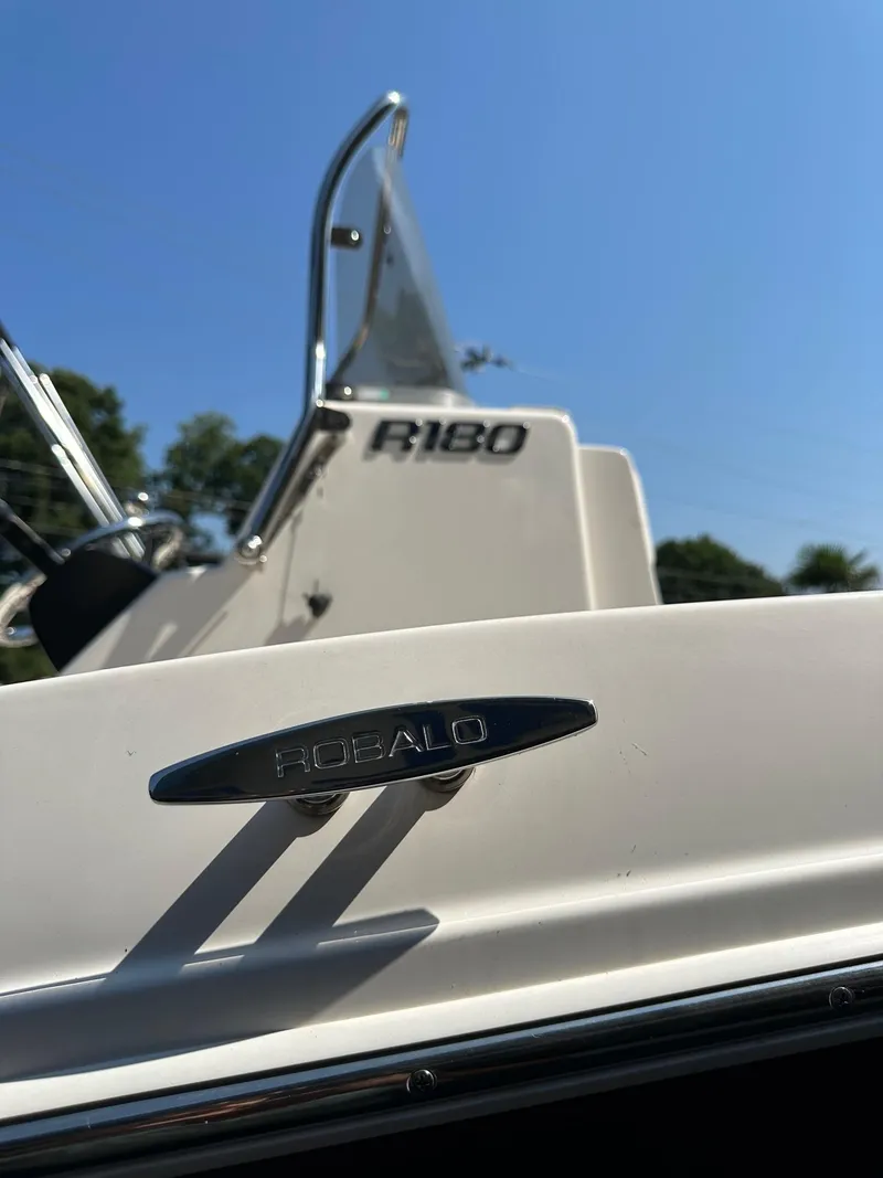 Slide: The Image of 2023 Robalo R180 Center Console boat with clear branding. - 3