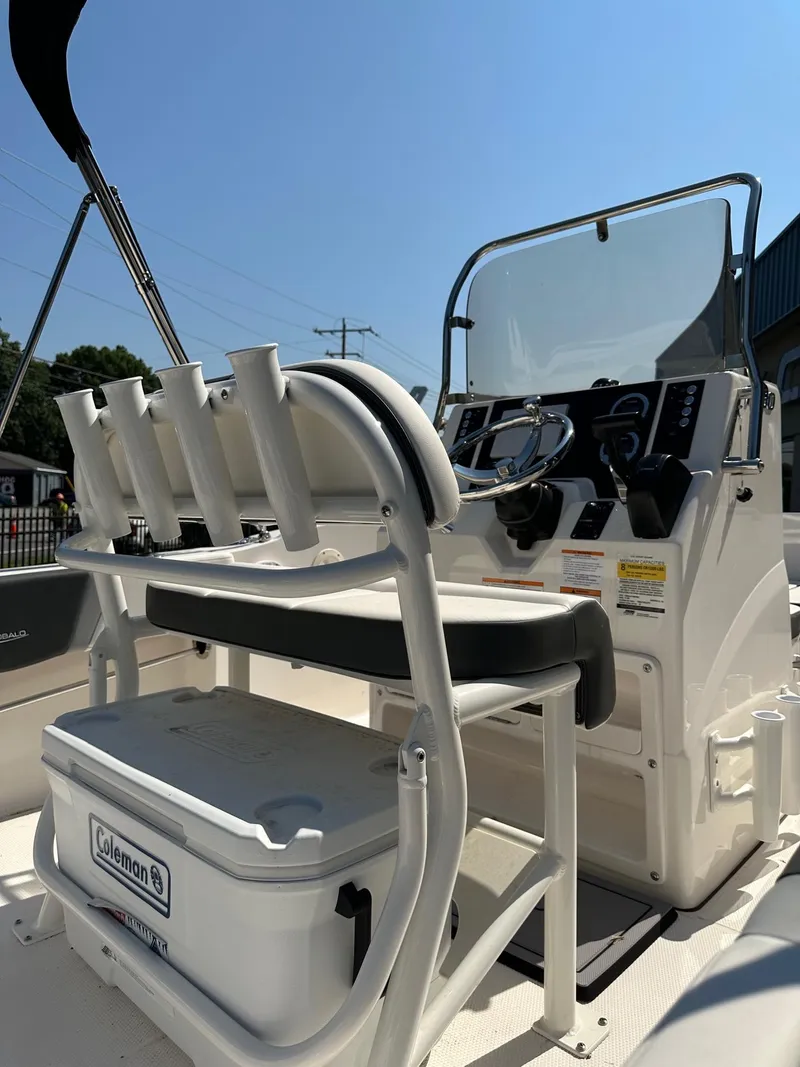 Slide: The Image of 2023 Robalo R180 Center Console boat interior with seating and console. - 4