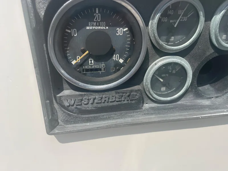 Slide: The Image of Close-up of gauges on a 1983 Bristol 45.5 Center Cockpit sailboat. - 14