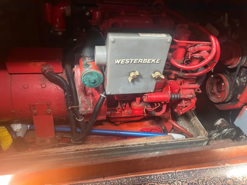 Slide: The Image of 1983 Bristol 45.5 Center Cockpit engine compartment with Westerbeke generator. - 32