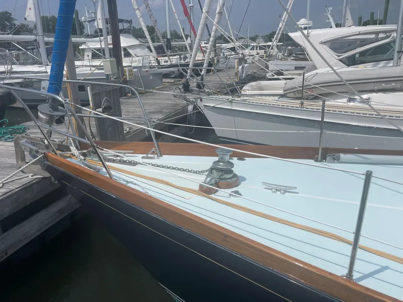 Slide: The Image of 1983 Bristol 45.5 Center Cockpit sailboat docked at a marina. - 6