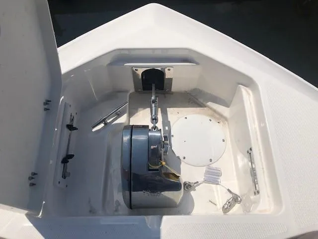 Slide: The Image of Anchor storage compartment of 2023 NauticStar 24 XS boat. - 13