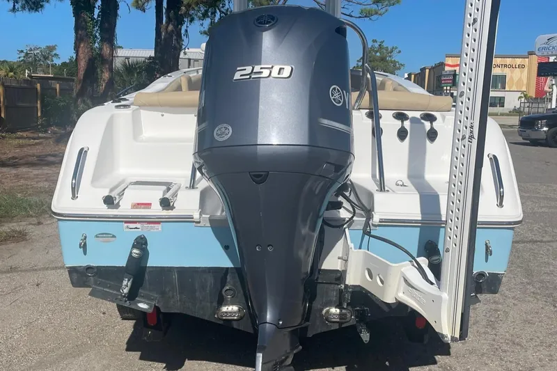 Slide: The Image of 2018 Sea Hunt Ultra 235 SE boat with Yamaha 250 outboard motor. - 5